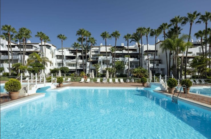 View from the pool of Puente Romano luxury urbanization - Marbella Golden Mile, Spain
